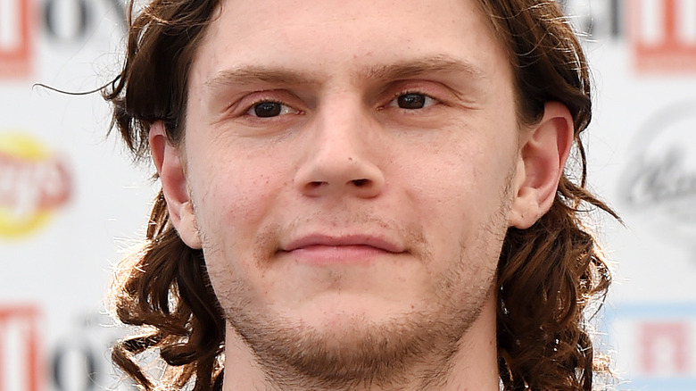 Evan Peters with long hair