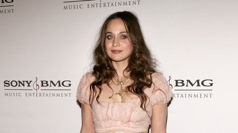 Fiona Apple posing curly hair