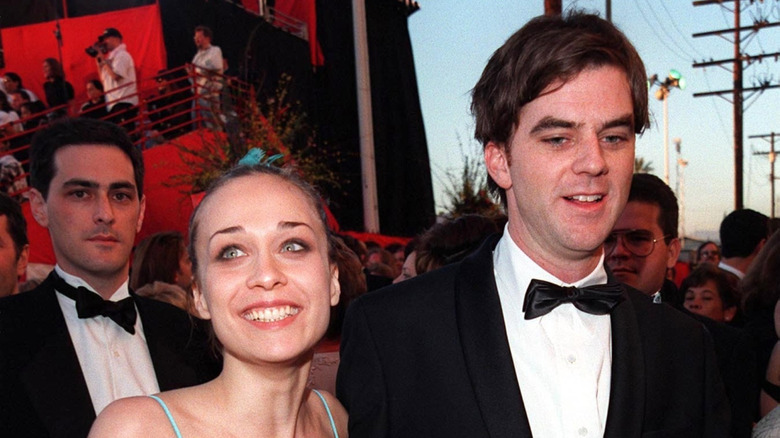 Fiona Apple smiling with Paul Thomas Anderson