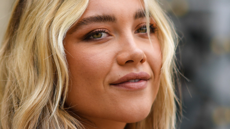 Florence Pugh smiling softly