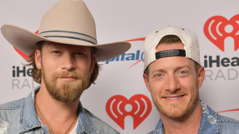 Brian Kelley and Tyler Hubbard both smiling