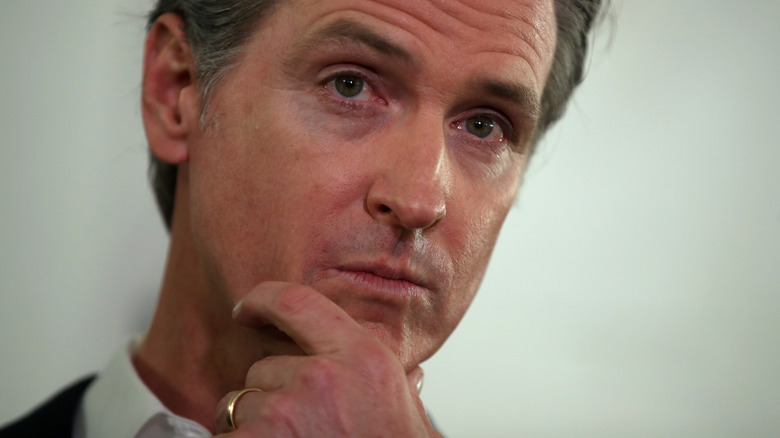 Gavin Newsom holding his chin