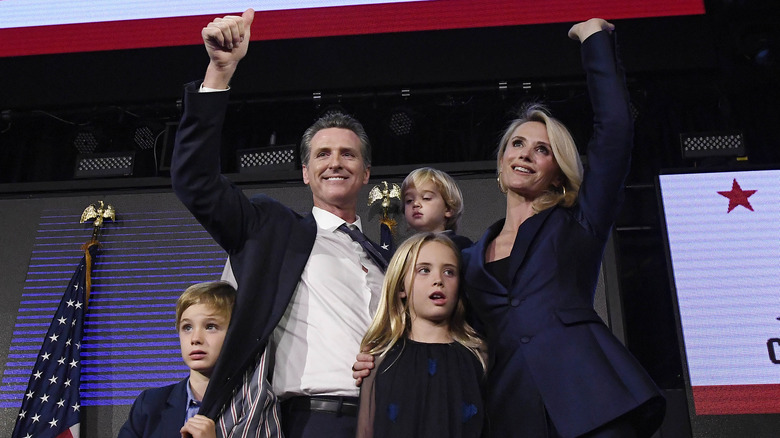 Gavin Newsom with his family at a political event