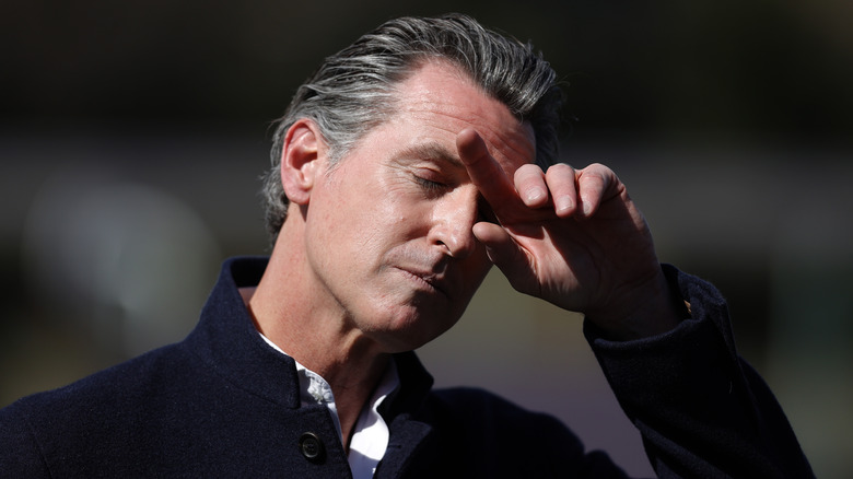 Gavin Newsom wiping his brow 