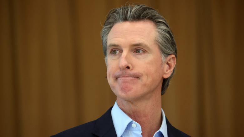 Gavin Newsom frowning at an event