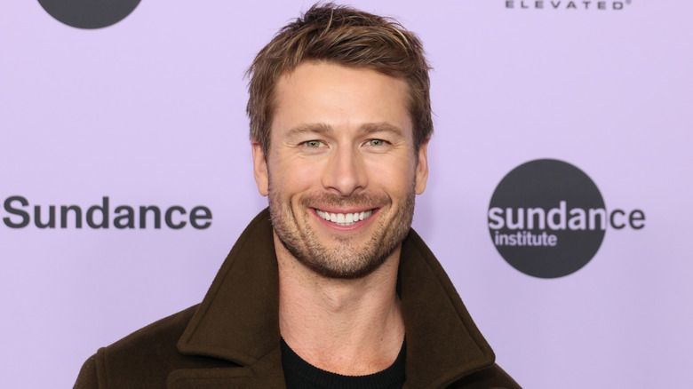 Glen Powell smiling