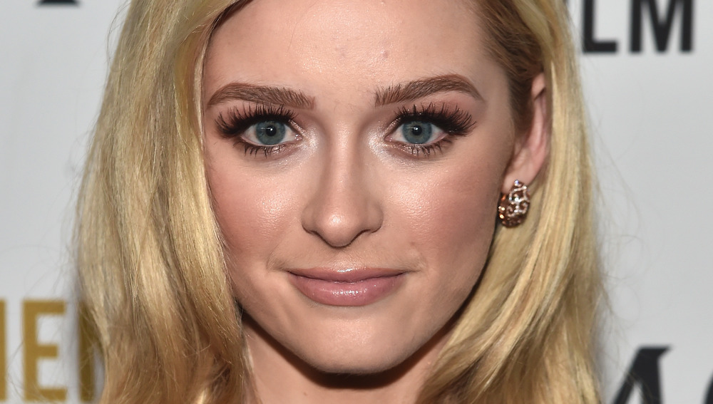 Greer Grammer posing at an event 