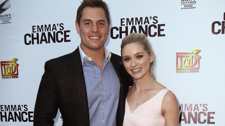 Tyler Konney and Greer Grammer posing together on the red carpet