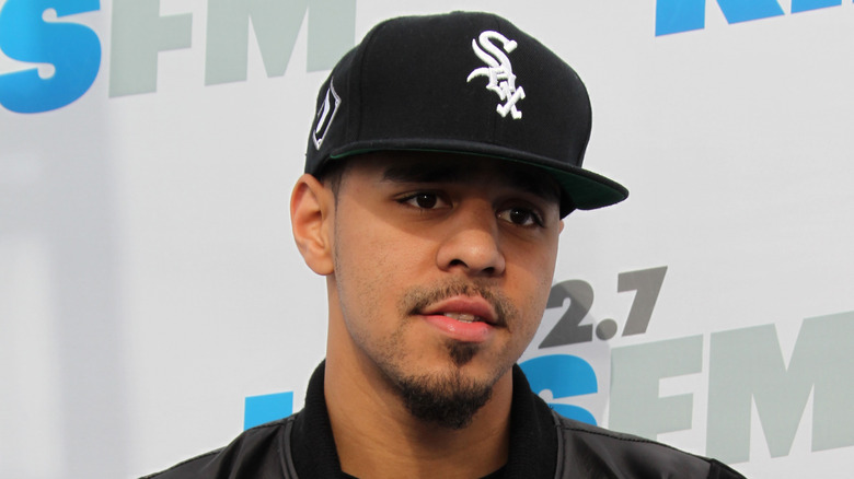 J. Cole posing