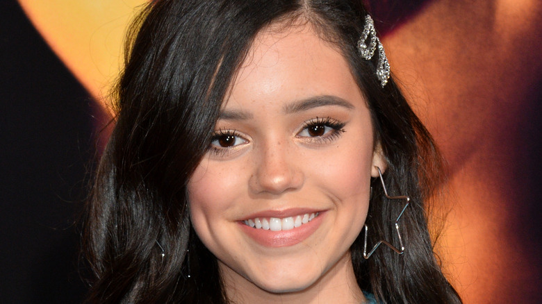 Jenna Ortega smiling at an event