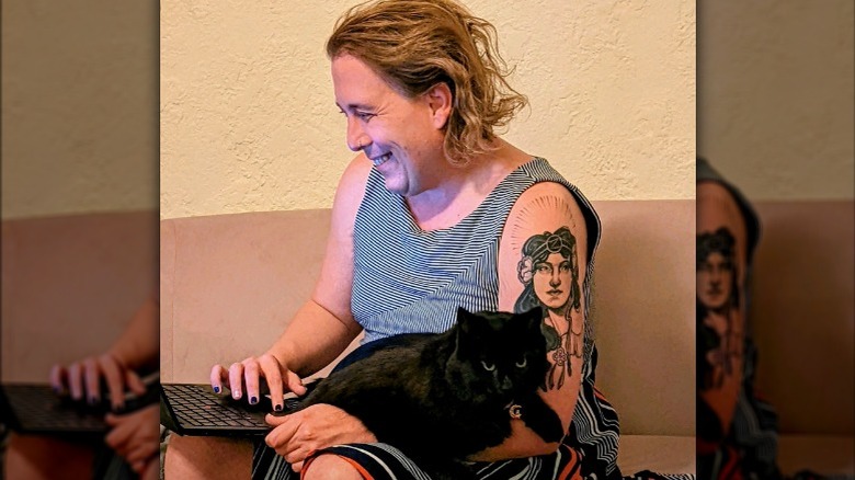 Amy Schneider using laptop