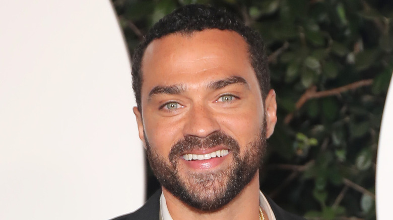 Jesse Williams posing at an event