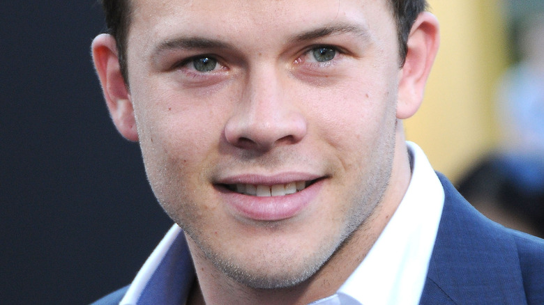 Jimmy Tatro with an open collar