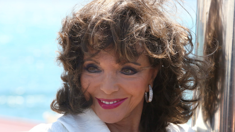 Joan Collins at Cannes, smiling