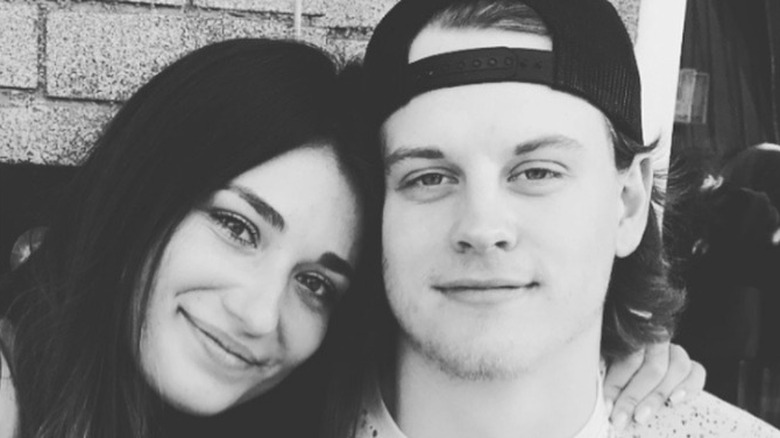 Olivia Holzmacher and Joe Burrow posing