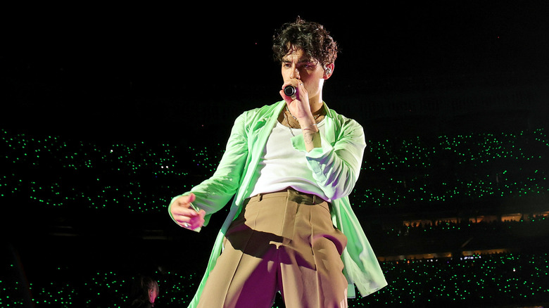 Joe jonas performing on stage
