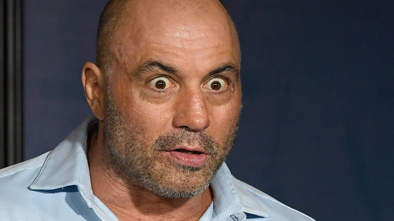 Joe Rogan making a silly face on stage