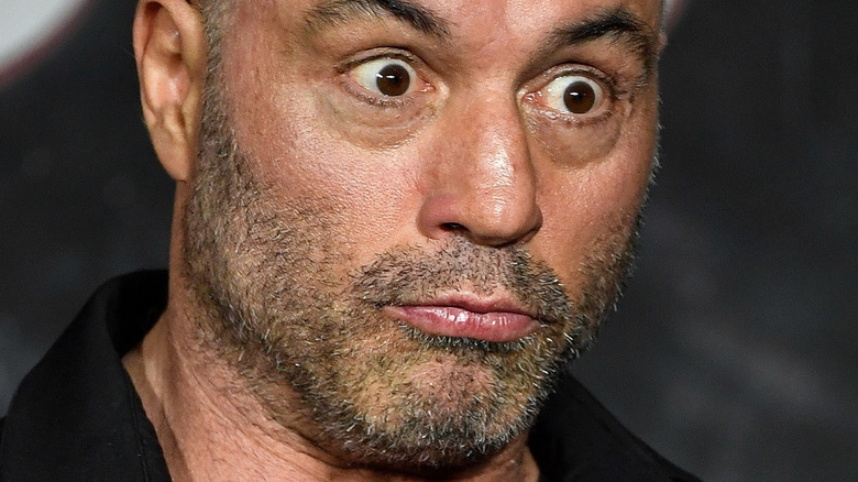 Joe Rogan making a face on stage