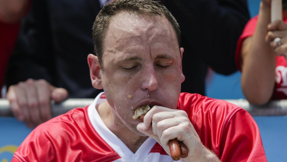 Joey Chestnut eating hot dogs