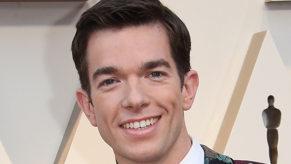 John Mulaney smiling