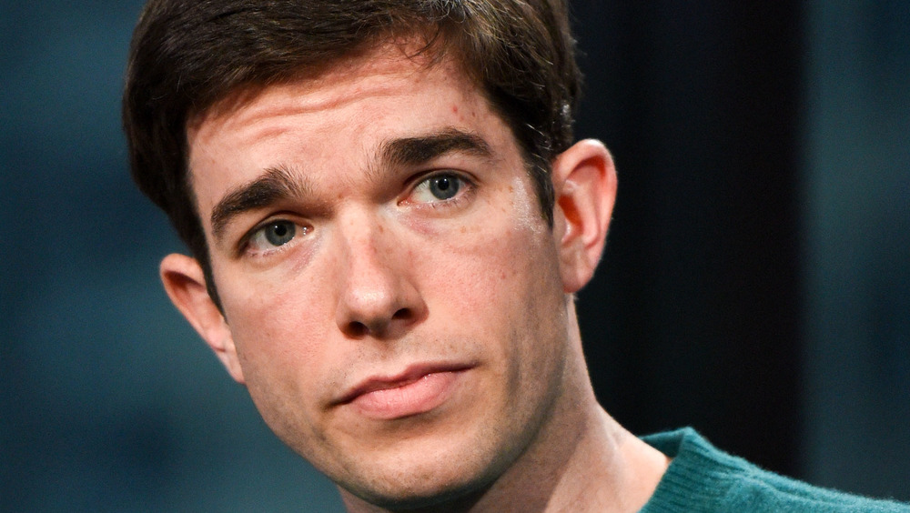 John Mulaney looking sullen