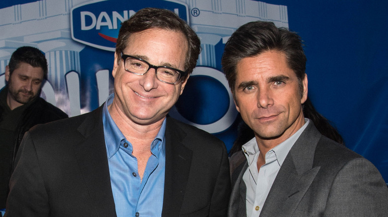 Bob Saget, John Stamos, smiling