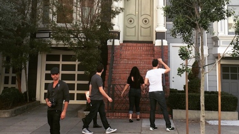 John Stamos at Full House house in San Francisco, near tourists