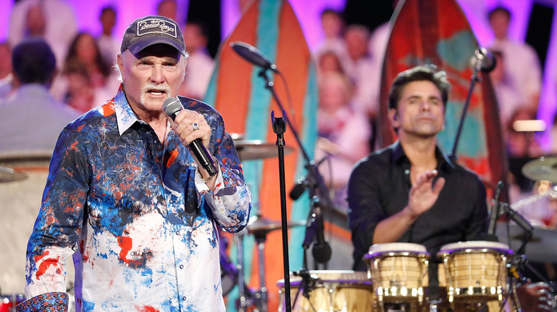 Mike Love of The Beach Boys, with John Stamos on drums
