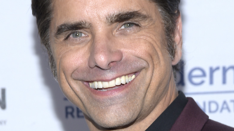 John Stamos smiling