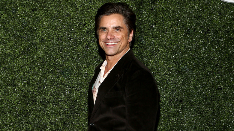 John Stamos at Wheelhouse event, smiling