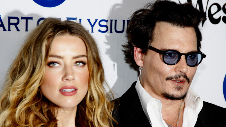 Amber Heard and Johnny Depp pose
