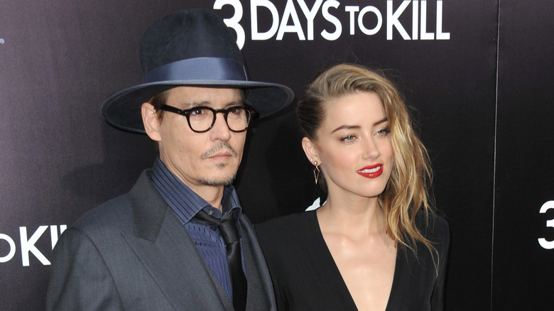 Johnny Depp and Amber Heard pose