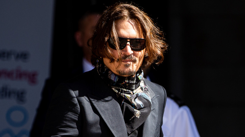 Johnny Depp in a black suit