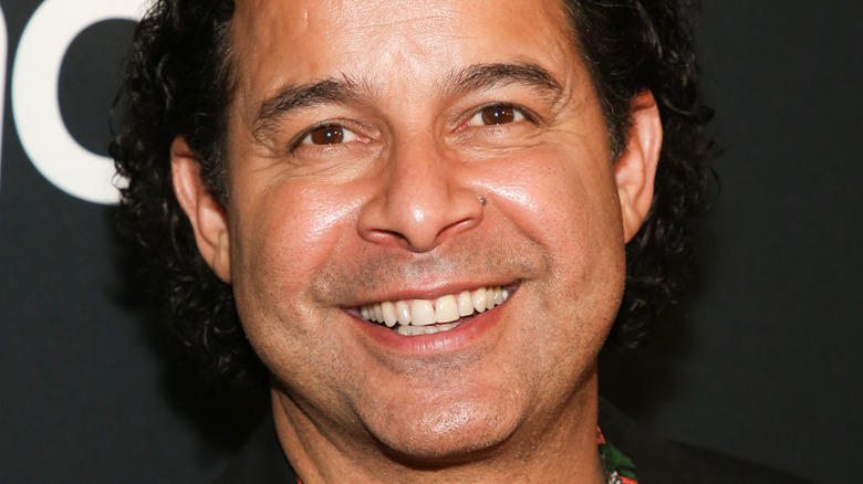 Jon Huertas smiling