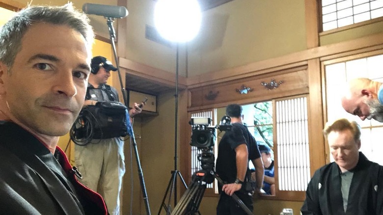Jordan Schlanksy and Conan O'Brien behind the scenes