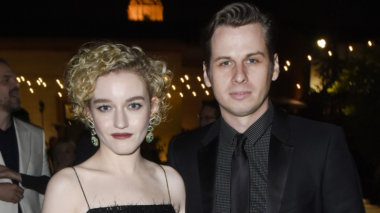 Julia Garner and Mark Foster posing together