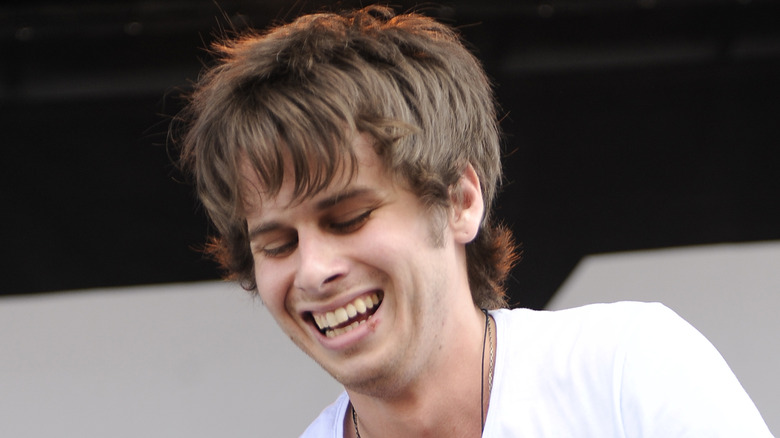 Mark Foster smiling on stage
