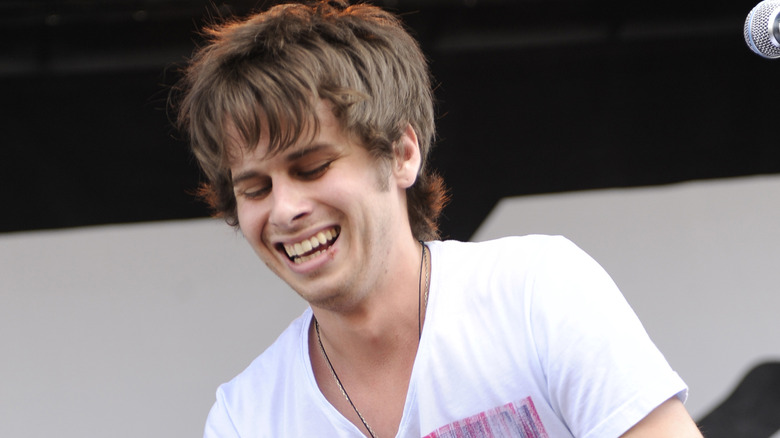 Mark Foster smiling on stage