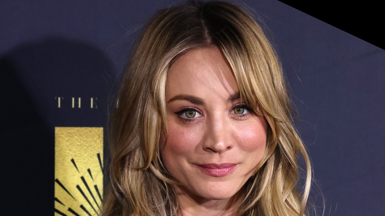 Kaley Cuoco smirking