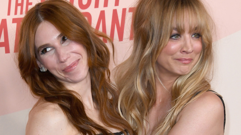 Zosia Mamet and Kaley Cuoco embracing