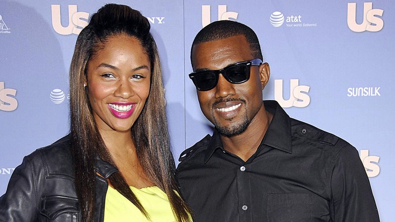 Alexis Phifer and Kanye West posing together