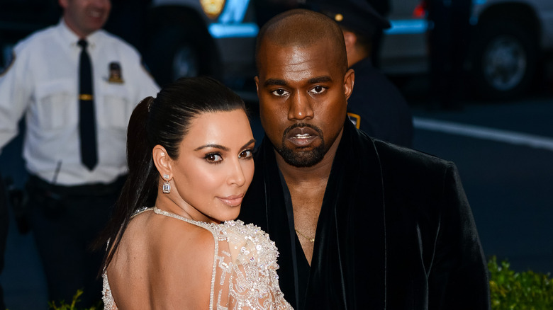 Kim Kardashian and Kanye West posing together