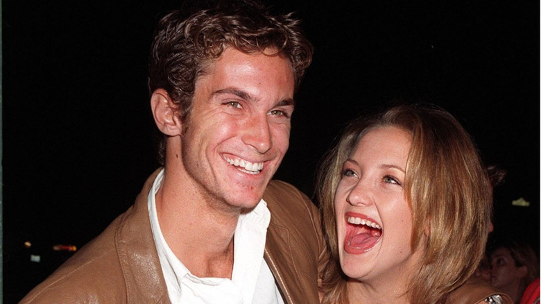 Kate and Oliver Hudson laughing