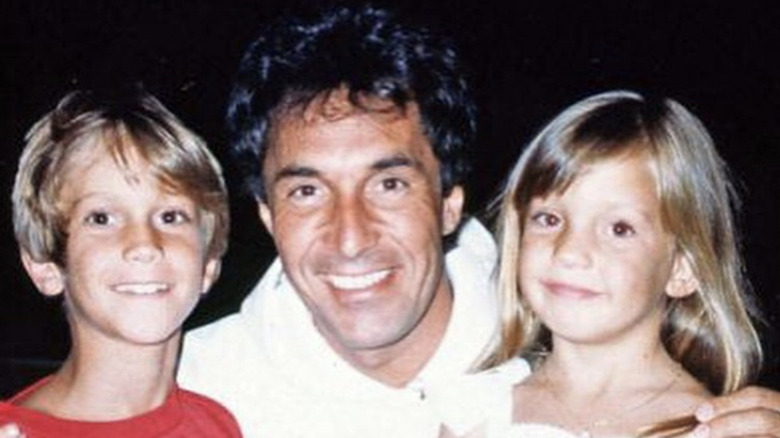 Bill Hudson poses with his children Oliver and Kate Hudson