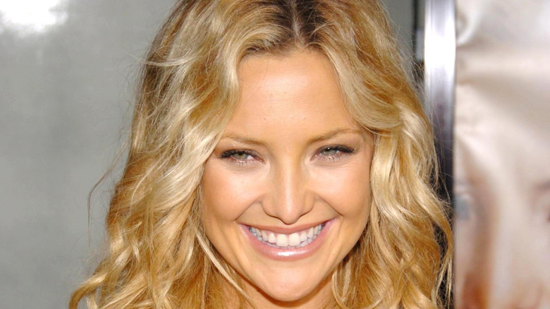 Kate Hudson smiles during an event