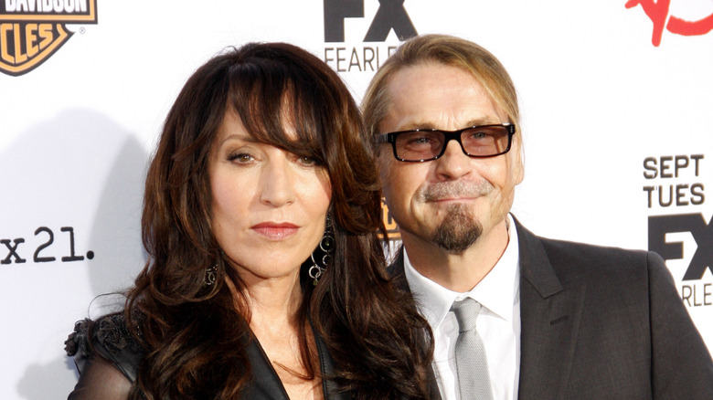 Katey Sagal with husband Kurt Sutter on a red carpet