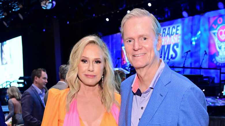 Kathy and Richard Hilton at an event, posing