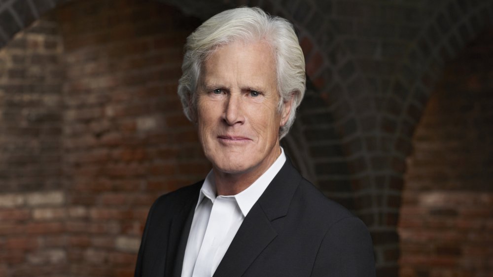 Keith Morrison in a black blazer and white button-up, posing with a neutral expression