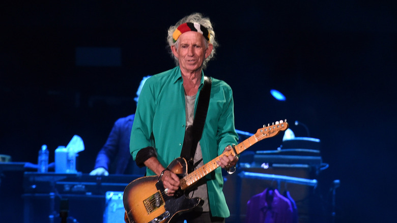 Keith Richards playing guitar