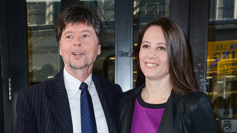 Ken Burns and Sarah Burns pose outside